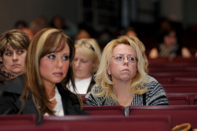 Anxiety shows on the faces of parents Renee Basile, left, and Ellen DeVito as they listen to district Superintendent Ray Bryant's presentation at Monday's Warwick Valley School District school board meeting. The board went against Bryant's recommendation on closing a district school and voted 6-3 to close Kings Elementary, not Park Avenue Elementary.