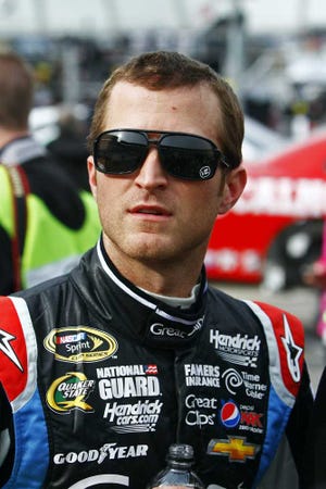 NASCAR Sprint Cup Series driver Kasey Kahne (5) looks on during qualifying for the Food City 500 auto race, Friday, March 15, 2013, in Bristol, Tenn. (AP Photo/Wade Payne)