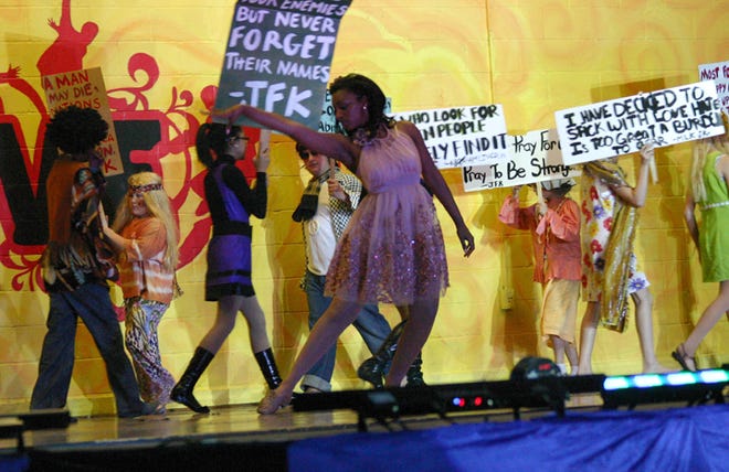 The Iberville Parish Talent Machine presented a 1960s musical entitled “Groovy” last week. Above, protesters display signs during a dance solo to “Abraham, John and Martin.” 
POST SOUTH PHOTO/Peter Silas Pasqua