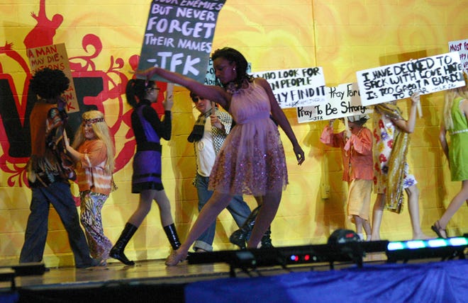 The Iberville Parish Talent Machine presented a 1960s musical entitled “Groovy” last week. Above, protesters display signs during a dance solo to “Abraham, John and Martin.”
POST SOUTH PHOTO/Peter Silas Pasqua