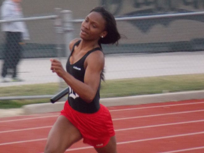 Senior Maiya Miles competing in the 800-meter relay at the Griffin Invitational earlier this season.