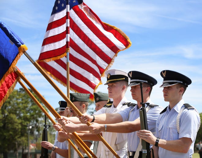 Cadets participate in the University of Florida Joint Service Pass in Review at Flavet Field on the UF campus Thursday.