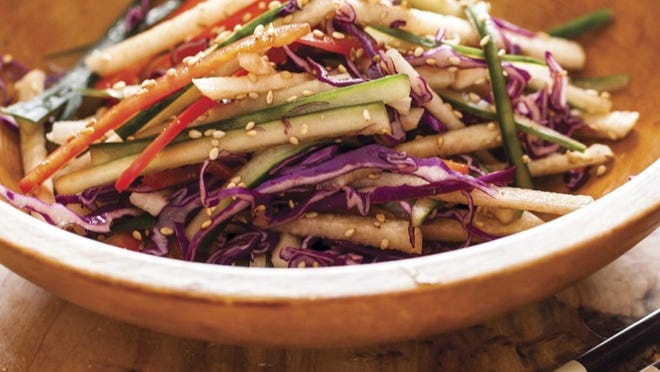 Jaden Hair’s new book “Steamy Kitchen’s Healthy Asian Favorites,” features a variety of family friendly Asian food, such as this Asian Slaw with Wasabi-Soy Dressing. Photo by Jaden Hair.