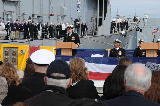 Capt. Paul Flood, Destroyer Squadron 14 commodore, hails the accomplishments and legacy of the guided-missile frigate USS Klakring during Friday's decommissioning ceremony at Mayport Naval Station.