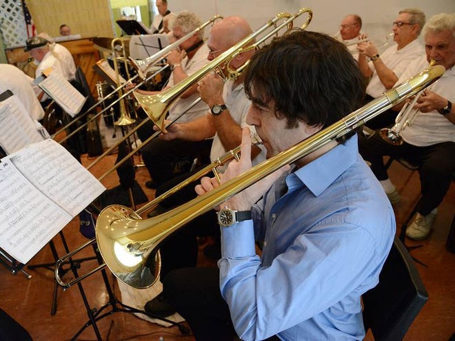 Trombonist Dan Levine sits in with the Dancers Delight big band at the Wayne Sanborn Center for an afternoon of jazz and swing music Monday in DeLand.