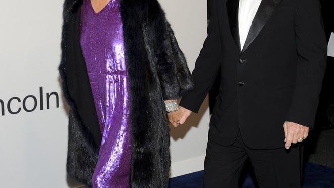 Designer Diane von Furstenberg, with husband Barry Diller in 2011, has created the Diane von Furstenberg Awards.