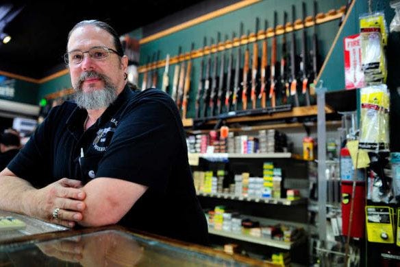 Ray Reynolds, the manager at United Loan and Firearms, says Comcast's decision to remove weapons ads is "out-and-out censorship … That's them pushing their political agenda." (MICHAEL HOLAHAN, Augusta Chronicle Staff)