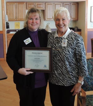 Courtesy photo

Rosemary Gluckler, RN of Beacon Hospice on right, is shown presenting an award to Karen Joslyn, RN, Director of Nursing at Bellamy Fields.