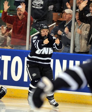 AP file photo 



UNH's Peter LeBlanc celebrates his game-winning goal in overtime that beat North Dakota in the first round of the 2009 NCAA Tournament in Manchester.