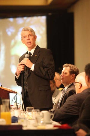 David Barton discusses the spiritual roots of the United States on Wednesday morning at the 52nd annual Kansas Prayer Breakfast at the Ramada Hotel and Convention Center, 420 S.E. 6th. Seated to Barton's right is Kansas Gov. Sam Brownback.