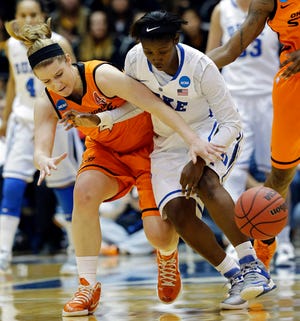 Duke's Alexis Jones, right, and Oklahoma State's Liz Donohoe chase a loose ball during the first half of Tuesday night's NCAA Tournament game.