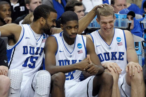 Duke's Josh Hairston, left, Amile Jefferson and Mason Plumlee react during the second half of Sunday night's game against Creighton in the NCAA Tournament.