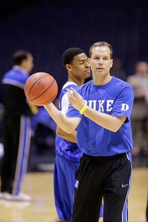Duke associate head coach Chris Collins goes through practice with the team Thursday.