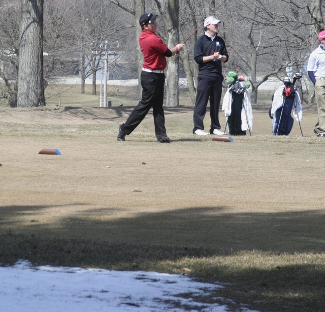 Monmouth College's Ryan Suttles watches his drive go at Gibson Woods.