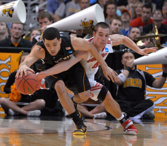 Wichita State's Fred Van Vleet, left, and Ohio State guard Aaron Craft chase a loose ball during the second half of the West Regional final in the NCAA men's college basketball tournament, Saturday, March 30, 2013, in Los Angeles. (AP Photo/Mark J. Terrill)