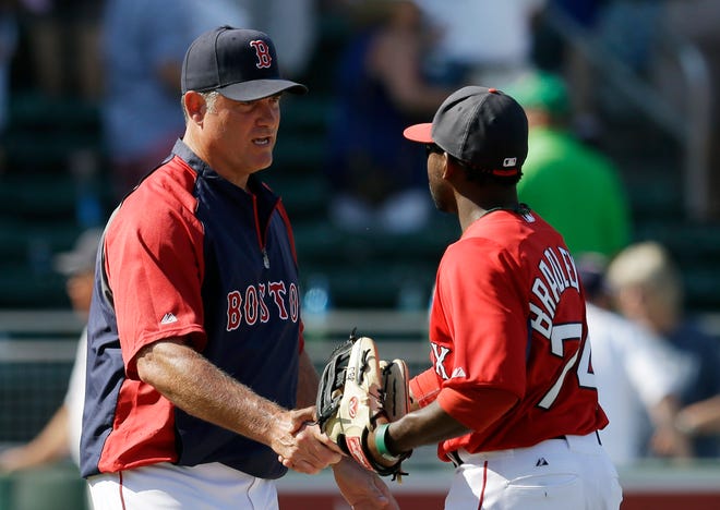 Manager John Farrell (left) and outfielder Jackie Bradley Jr. will be two of the new faces for the Red Sox when they open the season against the Yankees in The Bronx today.