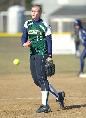 Abington High School's Hanna Rogers delivers a pitch during the varsity softball game in East Bridgewater on Tuesday, April 2, 2013.