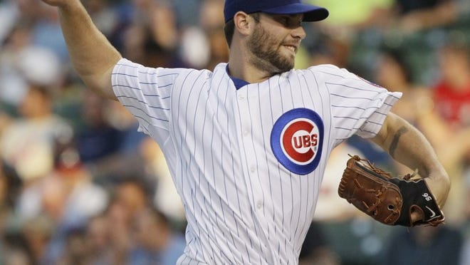 Former Chicago Cubs starter Randy Wells will join Round Rock’s pitching rotation this season. He made 82 starts for the Cubs from 2009-11. Credit: AP Photo/Nam Y. Huh