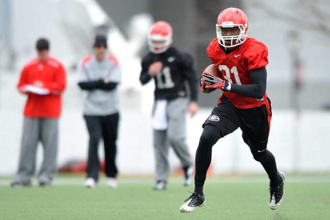 Georgia wide receiver Chris Conley runs after catching a pass during an NCAA college football spring practice in Athens, Ga., Saturday, March 2, 2013. (AJ Reynolds/Staff)