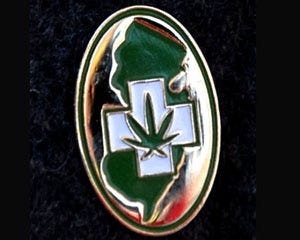A pin displayed during a press conference held on the steps of the New Jersey Statehouse in Trenton on Wednesday marking the two year anniversary of the signing of New Jersey's medical marijuana law.