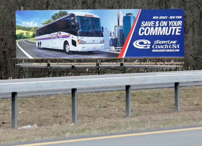 A Short Line-Coach USA billboard on Route 17 in Chester touts savings for bus commuters. Short Line is building a new garage and office complex in Chester.