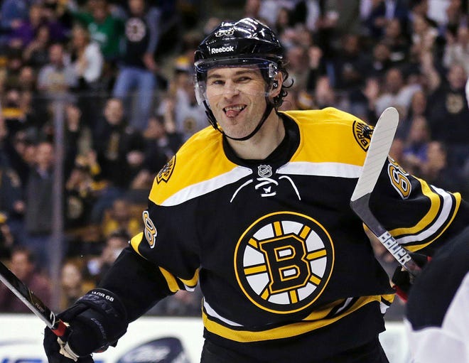 Bruins right wing Jaromir Jagr sticks out his tongue after scoring in the second period of his first game since being traded to Boston from the Dallas Stars. His goal was the difference in the Bruins' 1-0 win over the Devils on Thursday night.