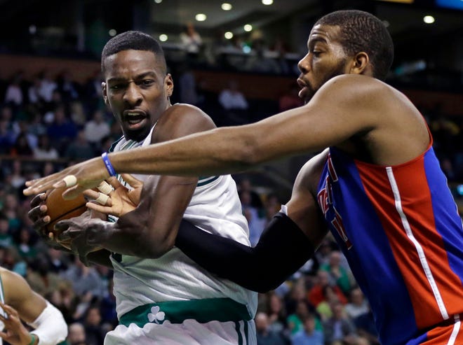 Celtics forward Jeff Green (left) controls the ball against Detroit's Greg Monroe during Boston's win on Wednesday.