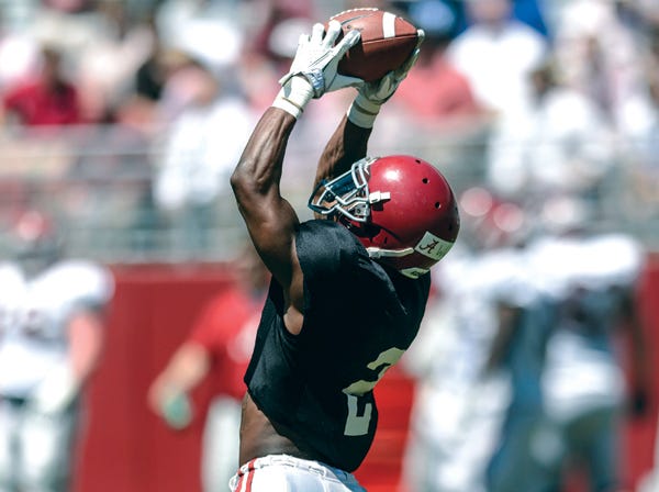 Alabama wide receiver DeAndrew White catches a pass during practice Saturday before the Tide scrimmaged.
(Vasha Hunt | AL.com | Associated Press)
