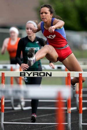 Oregon High School's Cydney Long runs a 100-meter hurdles prelim Friday, May 11, 2012, during the IHSA Class 1A Sectional in Byron.