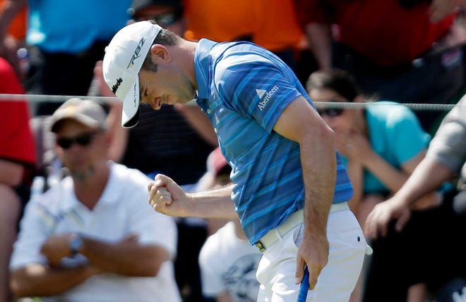 Martin Laird, of Scotland, pumps his fist after a birdie on the 16th hole during the final round of the Texas Open golf tournament on Sunday in San Antonio.