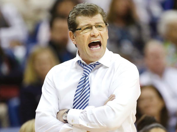 Geno Auriemma and the Connecticut Huskies play Louisville tonight in New Orleans.
(Dave Martin | Associated Press)