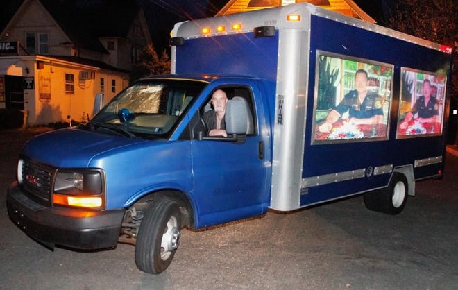 Matthew Cane just started a business where he uses large TV screens placed on his truck to advertise businesses. A Doylestown councilman is objecting to the truck, which is advertising two Doylestown Township supervisor candidates in the town. Cane's driver, Ed Fox of Warrington, is behind the wheel as it was parked off of South Main Street in Doylestown Tuesday night with the trucks screens dedicated to a fallen firefighter.