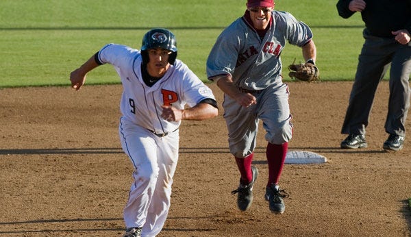 Pacific’s Tyger Pederson tries to outrun Santa Clara’s Justin Viele before being tagged out during a rundown Tuesday.
