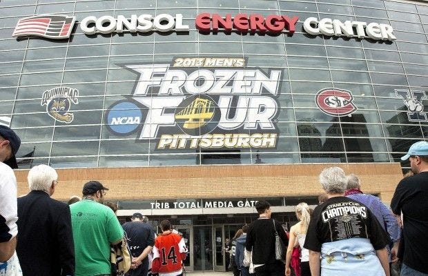 Fans wait in line to enter Consol Energy Center prior to the Yale and Massachsetts-Lowell game on Thursday, April 11, 2013.