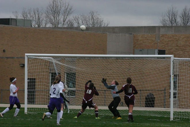 Canton goalie Mel Turgeon waits for the ball to come down just in front of the goal in the Lady Giants’ match against IVC on Thursday. Turgeon recorded 20 saves before leaving the game with an injury at the 59 minute-mark. IVC ended up winning 4-0.