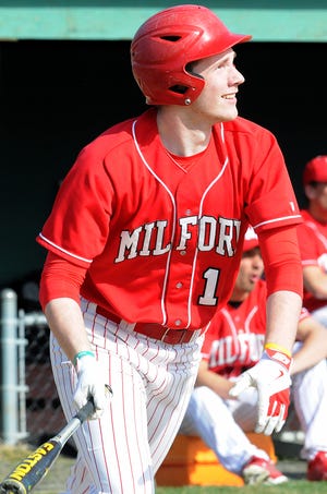 Milford's Chris Trafecante watches a hit during the Scarlet Hawks' 7-1 victory over Canton on Wednesday afternoon.