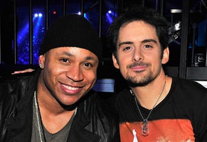 LL Cool J and Brad Paisley | Photo Credits: Jerod Harris/ACMA2013/Getty Images