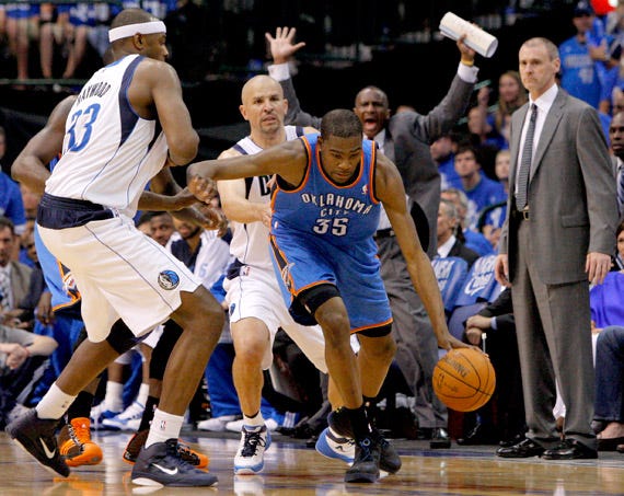 Oklahoma City's Kevin Durant (35) tries to get around Brendan Haywood (33) of Dallas and Jason Kidd (2) during game 1 of the Western Conference Finals in the NBA basketball playoffs between the Dallas Mavericks and the Oklahoma City Thunder at American Airlines Center in Dallas, Tuesday, May 17, 2011. Photo by Bryan Terry, The Oklahoman