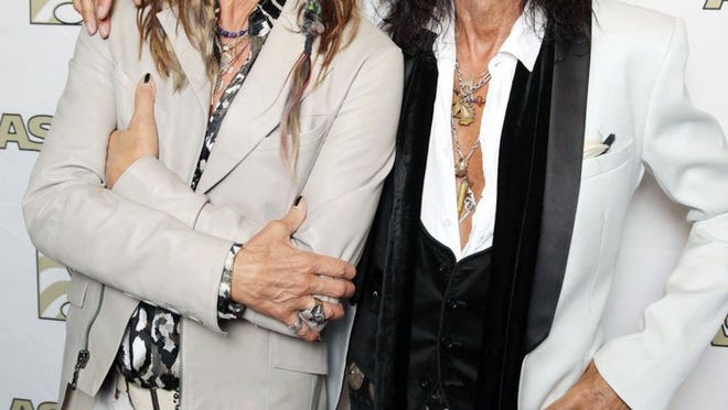 In this April 8, 2013 photo, Steven Tyler, left, and Joe Perry, recipients of the ASCAP Founders Award, pose at the ASCAP Press Conference held at the Sunset Marquis, in Los Angeles. Tyler and Perry will be honored with the award during ASCAP’s 30th annual Pop Music Awards at a gala on Wednesday.