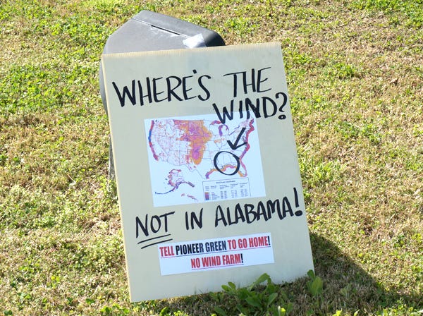 Some wind farm detractors put up signs urging rejection of the proposals at open house sites.