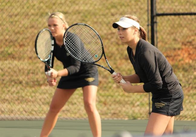 Erica White, foreground, and Jenny Lunde, in the background, are nationally ranked as a doubles pair for Gardner-Webb.