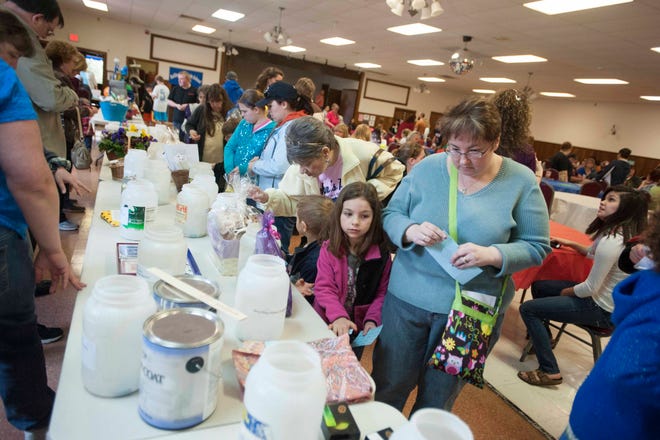 Ryan McBride/Staff photographer Local area residents came out to enjoy the Penny Sale at the Rollinsford VFW Sunday morning to help raise funds for the Rollinsford Grade School.