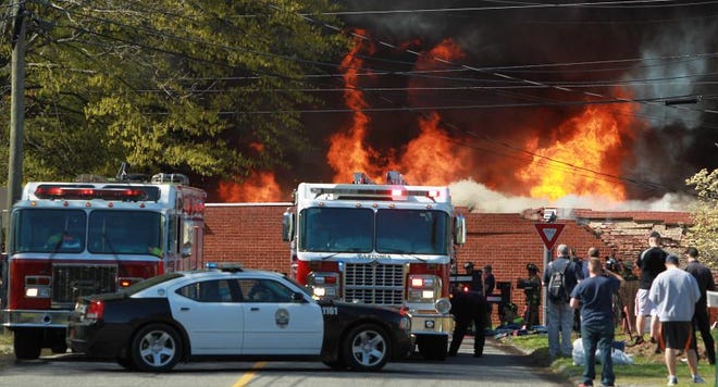(Photo by Mike Hensdill/The Gazette) File photo from Saturday, April 13, 2013, fire at former National Textiles mill fire on Poplar Street.