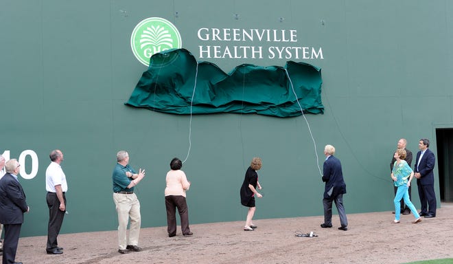 The Greenville Health System logo is unveiled before a game between the Greenville Drive and West Virginia Power on Monday, April 15, 2013, at Fluor Field at the West End in Greenville, South Carolina.