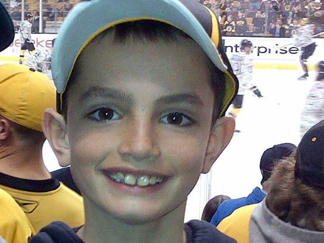 This undated photo provided by Bill Richard shows his son, Martin Richard, in Boston. Martin Richard, 8, was among the at least three people killed in the explosions at the finish line of the Boston Marathon Monday, April 15, 2013. (AP Photo/Bill Richard)