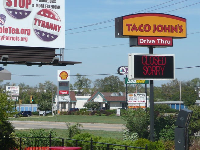 The Taco John's restaurant at 3629 S. Alpine Road flashed this "closed" message on Tuesday, Sept. 11, 2012. The eatery is reopening on Tuesday, April 16, 2013.