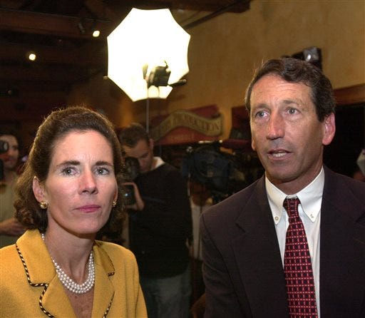 South Carolina Republican gubernatorial candidate Mark Sanford, and his wife, Jenny, watch returns at an election-night party in this Nov. 5, 2002 file photo taken at a restaurant in Mount Pleasant, S.C. Former South Carolina Gov. Mark Sanford must appear in court two days after running for a vacant congressional seat to answer a complaint that he trespassed at his ex-wife's home, according to court documents acquired by The Associated Press on Tuesday April 16, 2013. (AP Photo/Lou Krasky, File)