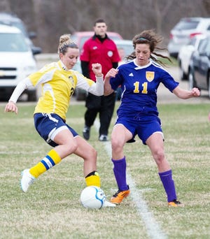 Hillsdale's Hayley Maystead (3) gets around a Blissfield defender during Wednesday's game. The visiting Royals defeated the Hornets 3-2. Jim Drews photo
