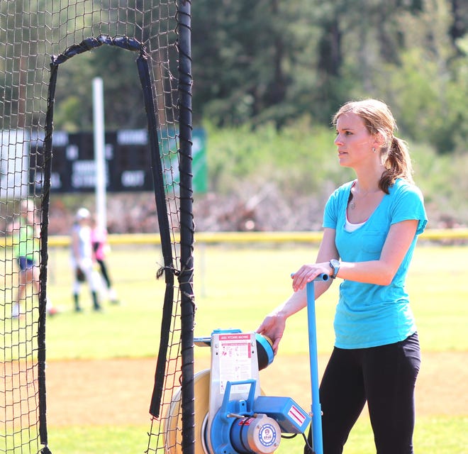 Swansboro softball coach Kelly Frank prepares for a recent practice.