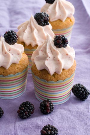Fruit punch spring cupcakes are a tasty treat for the season. (AP Photo/Matthew Mead)